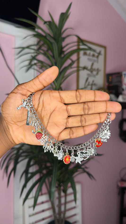 Red mixed charm bracelet (size medium 7)