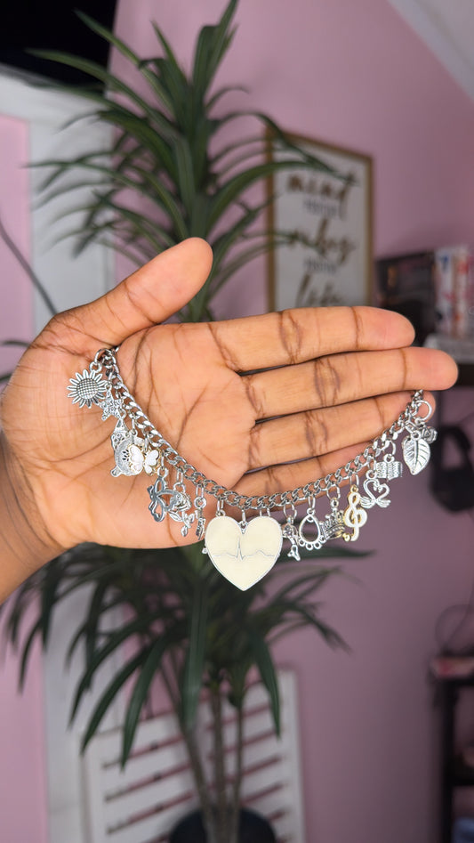 White mixed charm bracelet (size small 6.5 inch)