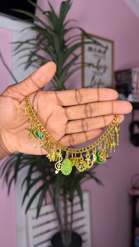 Green mixed charm bracelet (size small 6.5 inch)