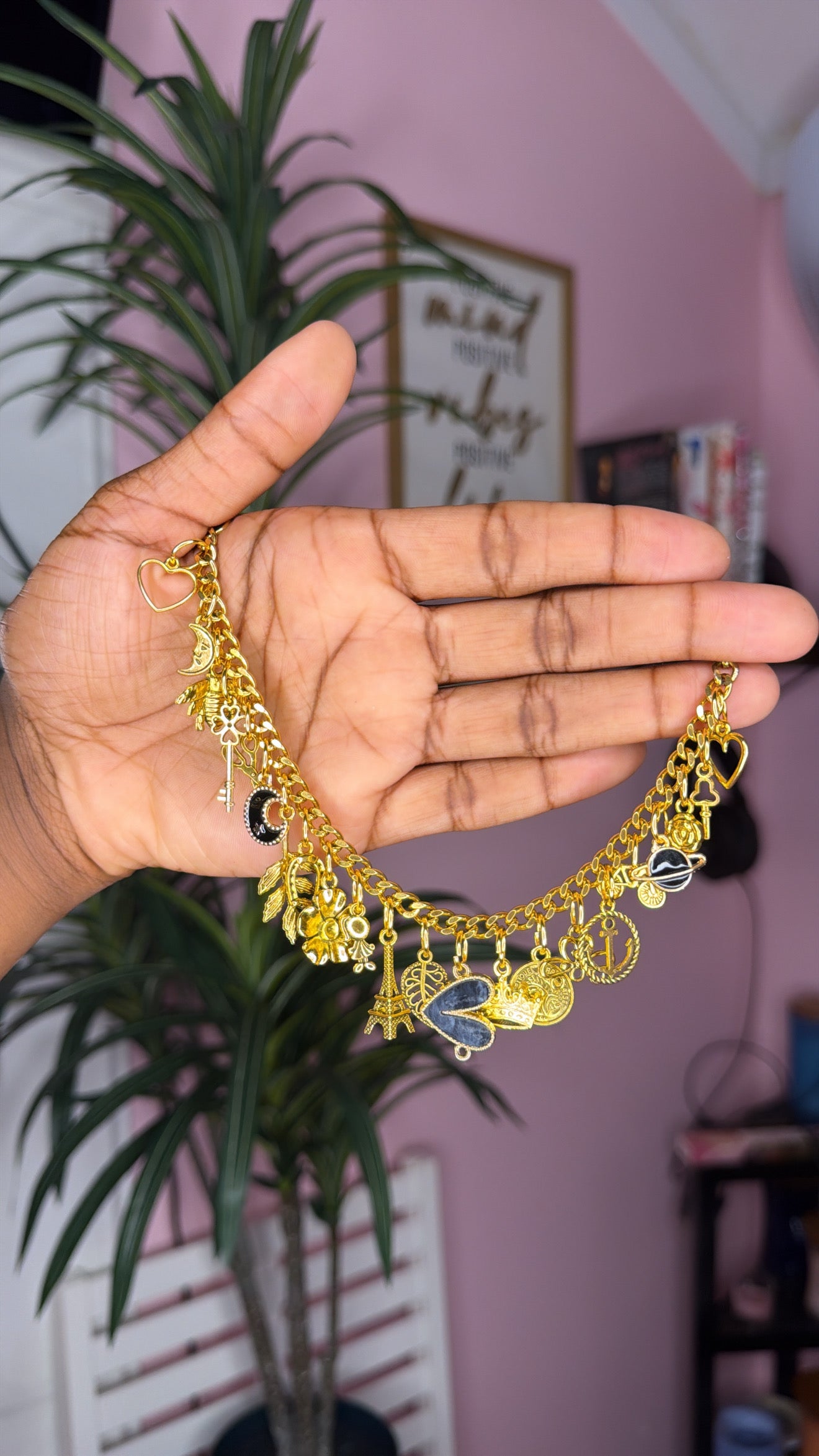 Black mixed charm bracelet (size large 7.5 inch)