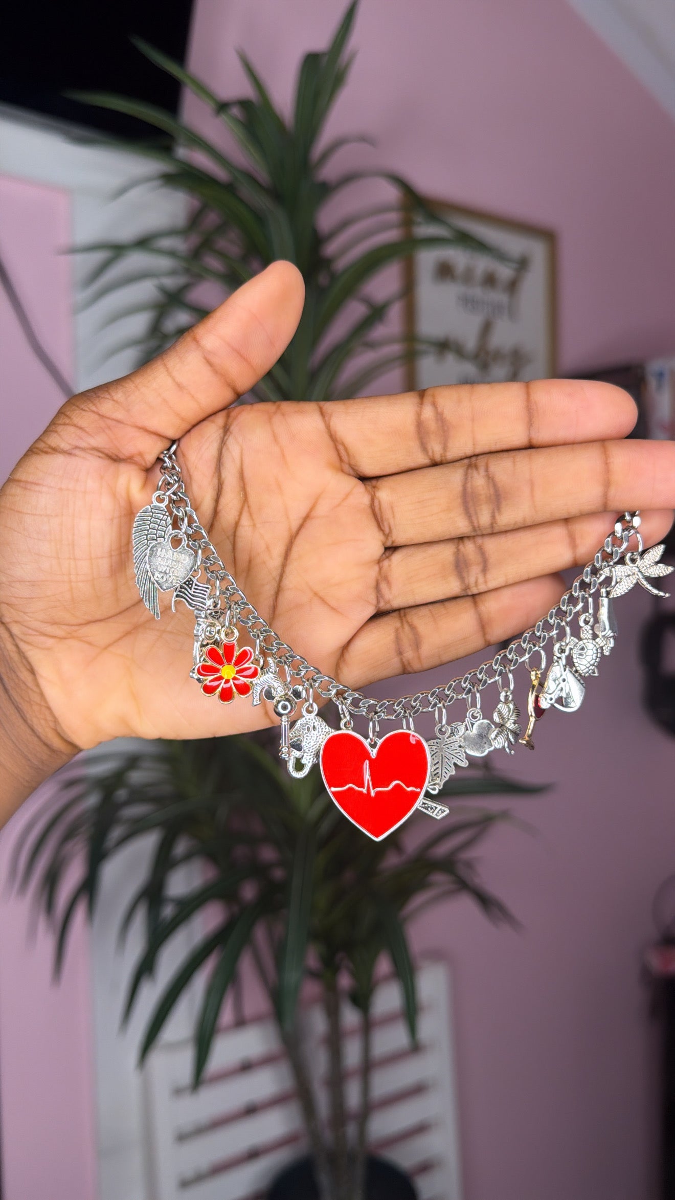 Red mixed charm bracelet (size small 6.5 inch)