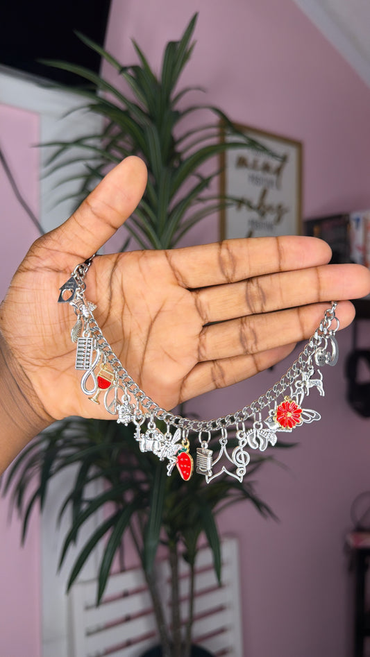Red mixed charm bracelet (size large 7.5 inch)