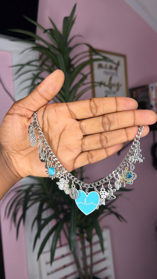 Blue mixed charm bracelet (size large 7.5 inch)
