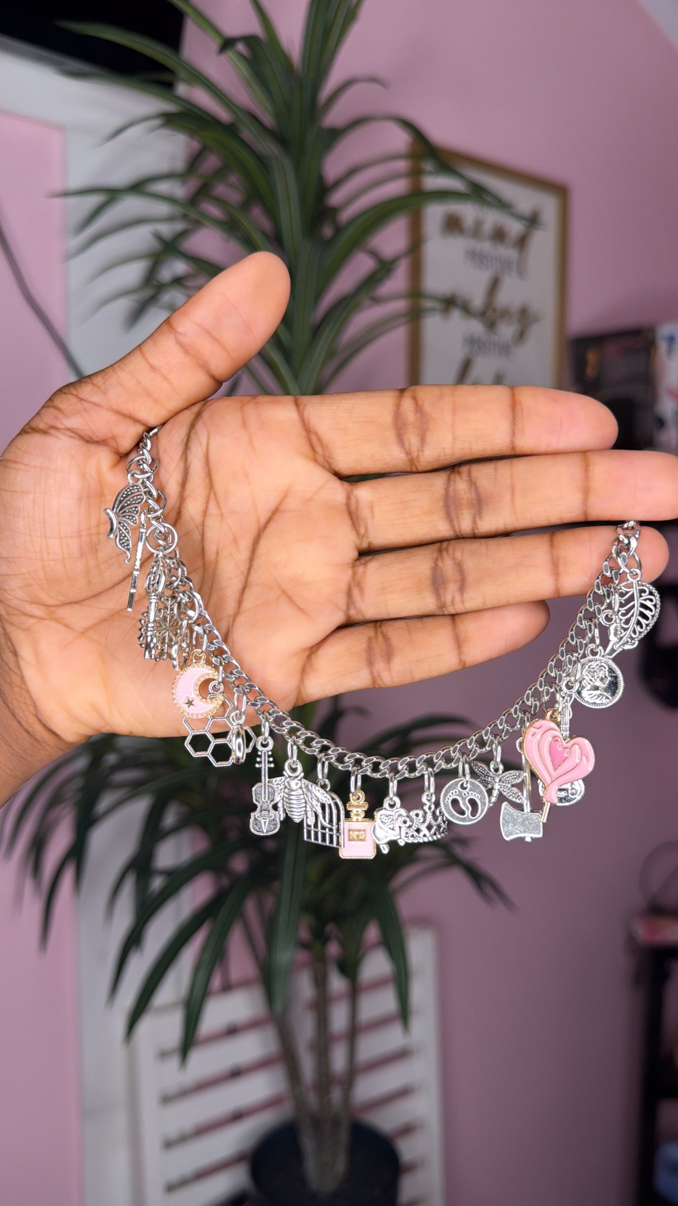 Pink mixed charm bracelet (size large 7.5 inch)
